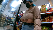 Woman shows boobs at gas station
