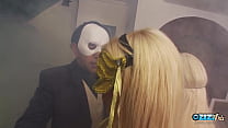 Lucky dude gets to bang two masked babes at once