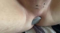 Guy with alu but plug and piercings.