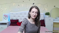 Brunette Afghan amateur babe KlaraDreval in grey blouse sitting in bed and chats with fans on private webcam show then takes off top and flashes
