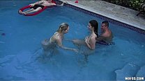 Two slutty skinny dipping girlfriends start orgy at a pool party