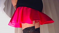 A Guy Wearing A Red Skirt, Black Thigh Highs, And Sexy Red Lace Panties
