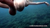 Cute Nastya swimming nude in the sea