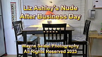 Liz Ashley takes off her robe to relax before going to bed