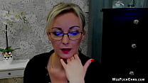 Big tits blonde amateur German MILF LUXvanessa with glasses in orange tight mini skirt and black blouse posing in front of webcam solo