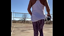 Sporty Shemale pees herself outdoors