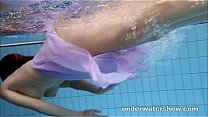 Swimming nude in pool