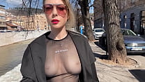 Sex wife walks on city streets in transparent top