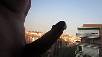 Nude in front of hotel window