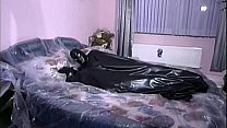 Couple in latex outfits fucking on bed
