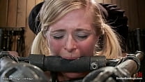Big tits blonde lesbian slave Penny Pax is stapped to different metal devices fingered and vibrated then anal fucked with dildo on a stick by lezdom Claire Adams