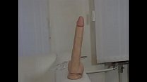 Young amateur slut fucks her pussy with a rubber cock