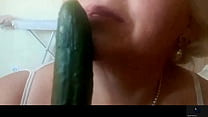 Lady Dalia enjoying cucumber which will end up as hubby's salad