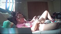 Slut fucks herself with a sex toy on hidden cam