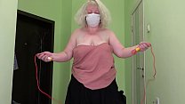 Thick mom jumps with a skipping rope, her big heavy boobs bounce, her fat ass shaking under a skirt.