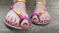 Hot blonde takes sandals off in Public
