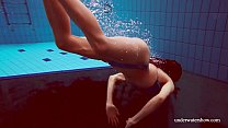 Martina swims naked with her sexy body