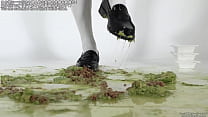 A girl steps on food with shoes