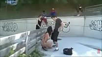 Threesome with audience in public park