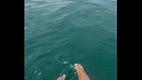 The warm sea water caresses my feet