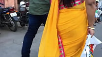 Cute structure of aunty in yellow saree