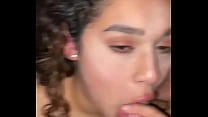Curly haired girl sucking dick