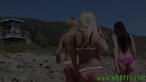 Horny teens blowing dude at beach party and fucking