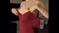 Wife Putting on Red Dress