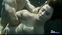 Sexy Titty Redhead is fucked underwater