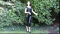 Latex lover Olivias outdoor fetish wear and long rubber boots on brunette babe i