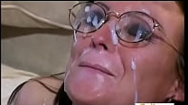 Brunette receives a ton of jizz on her nerdy glasses