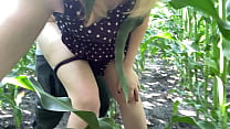 Risky sex of a beautiful girl in nature in the field