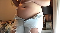 Full belly in small clothes