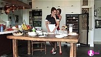 two lesbian girls fingering and eating pussy in the kitchen