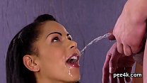 Arousing nympho enjoys peeing cock and gets covered with pee