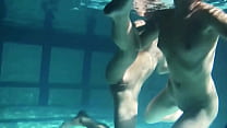 Hottest Russian babes swim and strip in the pool